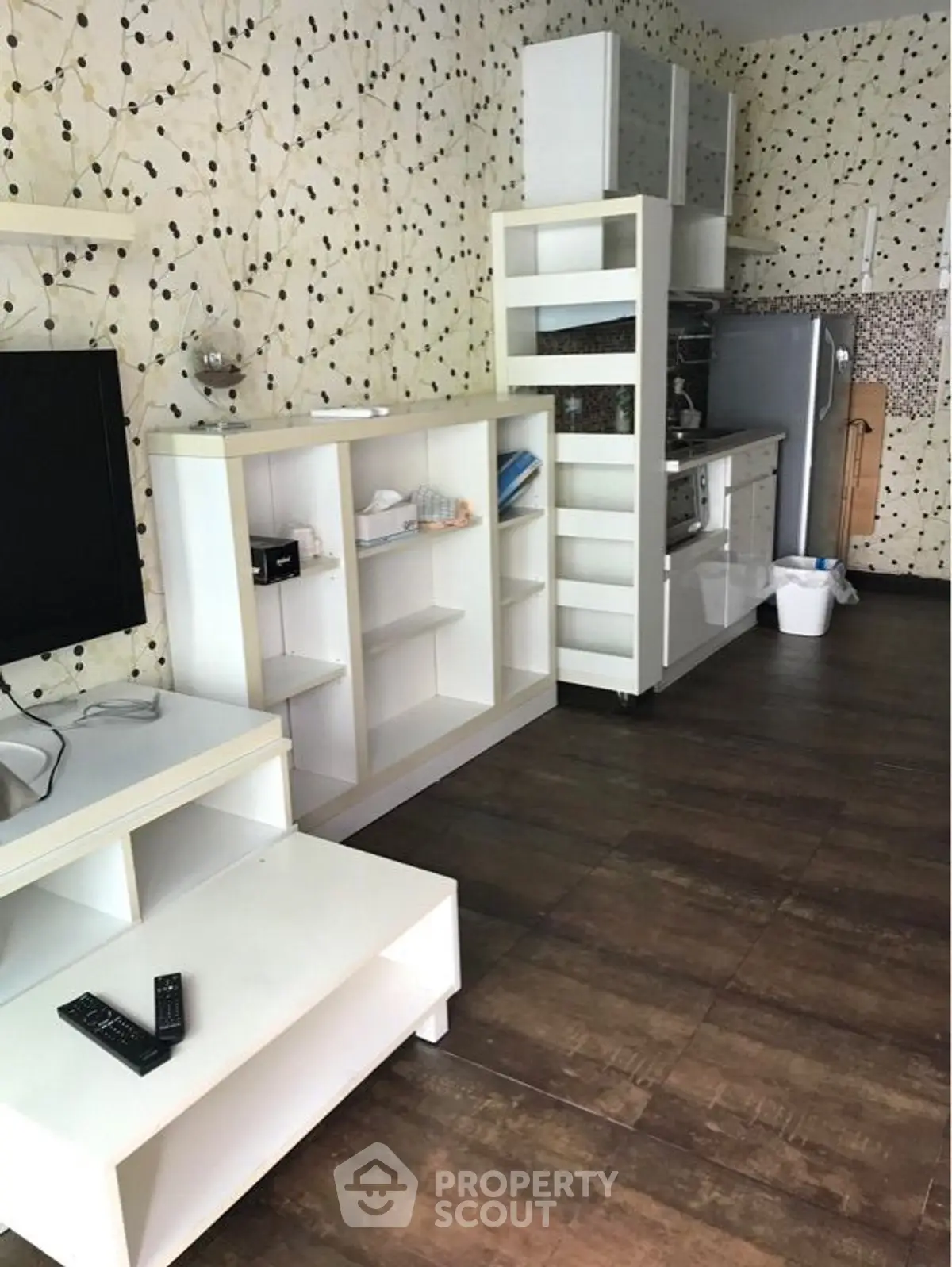 Modern living room with stylish open kitchen and contemporary decor