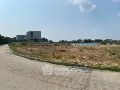 Prime vacant land with potential for development near serene water view
