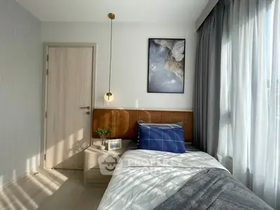 Cozy bedroom with modern decor and natural light