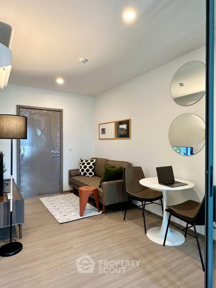 Modern living room with stylish decor and cozy seating area