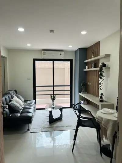 Modern living room with sleek furniture and natural light