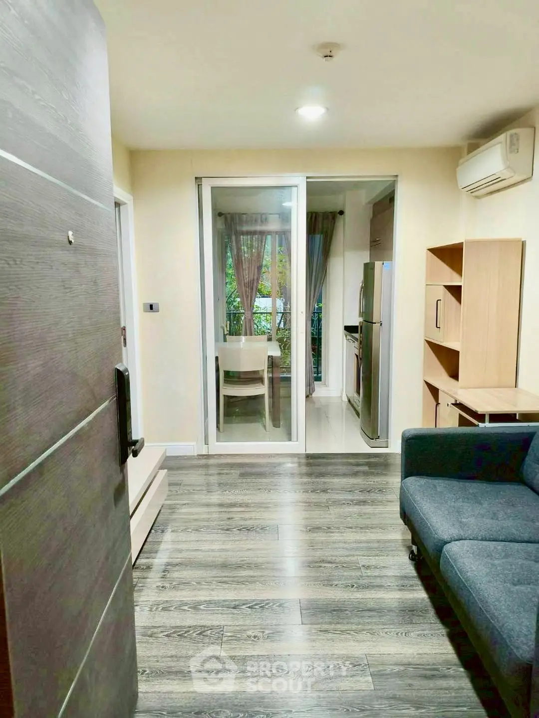 Modern apartment interior with open layout and stylish flooring