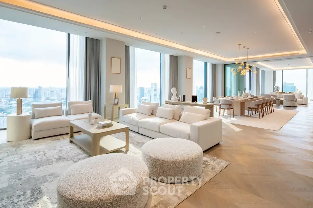 Luxurious open-plan living and dining area with panoramic city views and elegant modern furnishings.