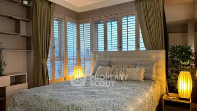 Luxurious bedroom with elegant decor and ambient lighting
