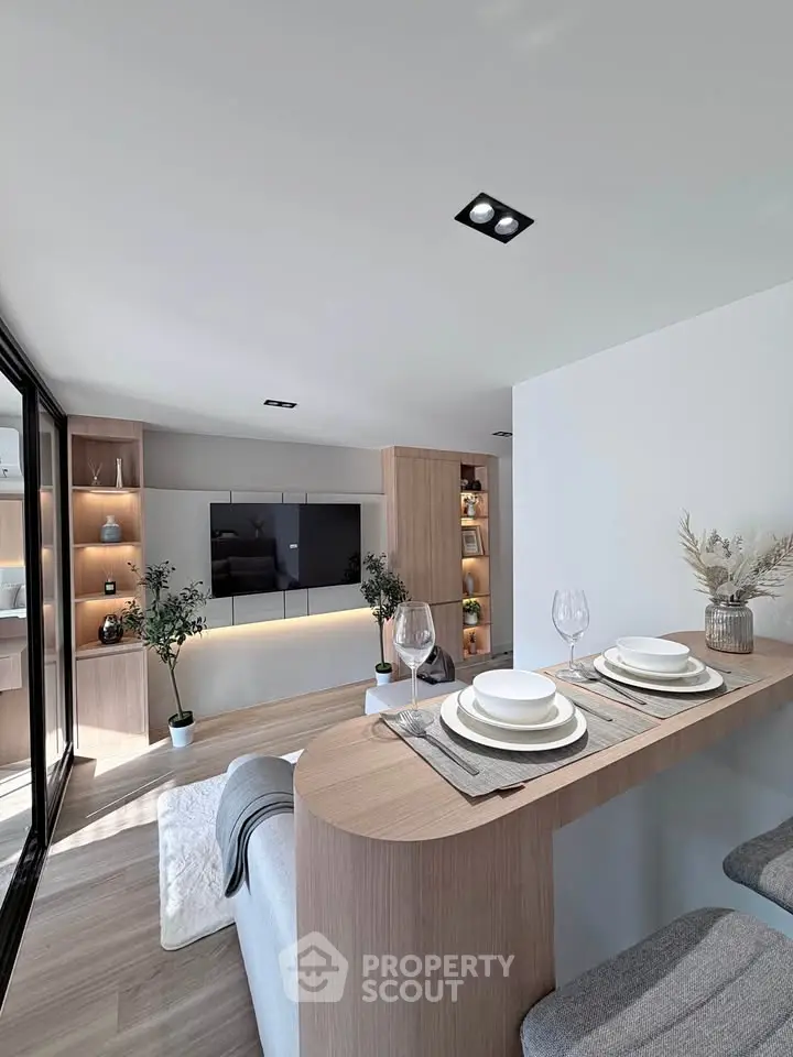 Modern living room with stylish open kitchen and elegant decor