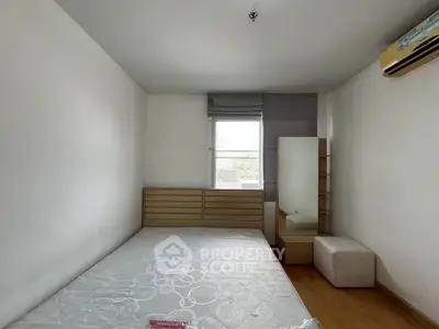 Spacious bedroom with minimalist design and natural light