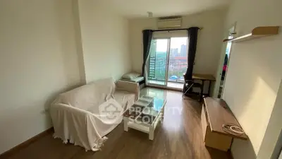 Cozy living room with balcony view in modern apartment
