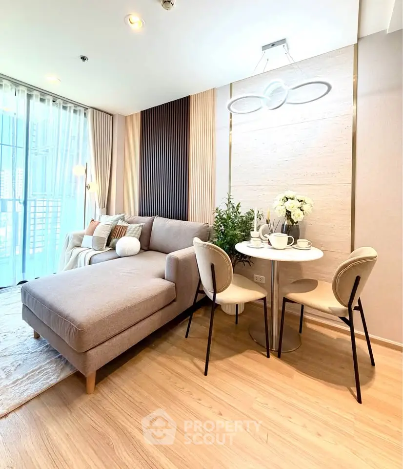 Modern living room with stylish furniture and natural light