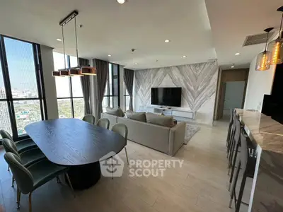 Luxurious modern living room with panoramic city views and elegant dining area.