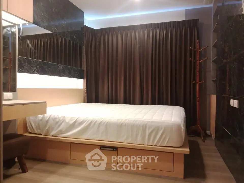 Modern bedroom with sleek design and cozy ambiance