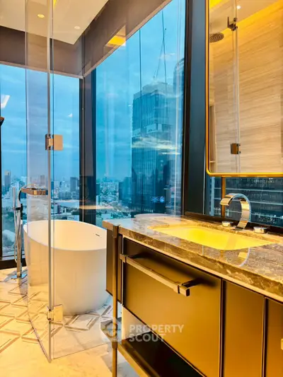 Luxurious bathroom with city view, featuring a modern freestanding bathtub and elegant fixtures.