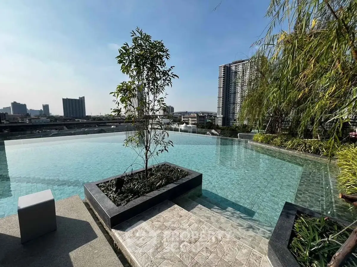 Luxurious rooftop infinity pool with stunning city skyline view