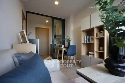 Modern living room with stylish furniture and open layout in a cozy apartment.