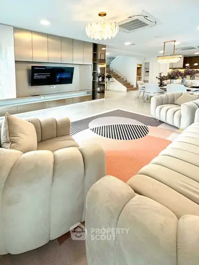 Luxurious modern living room with plush seating and elegant decor