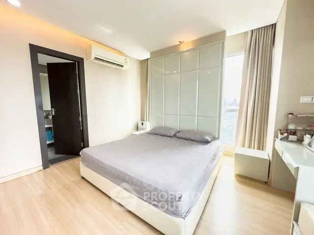 Modern bedroom with city view and sleek design