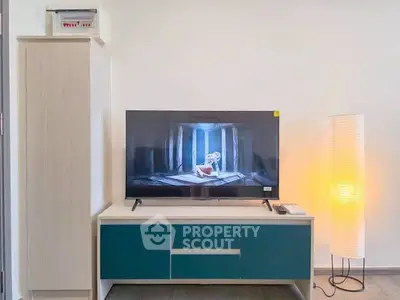 Modern living room with stylish TV stand and ambient lighting