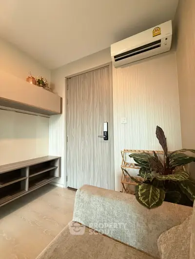 Modern living room with air conditioning and stylish decor