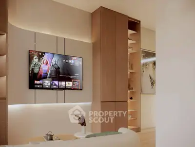 Modern living room with built-in shelves and wall-mounted TV, featuring elegant decor.