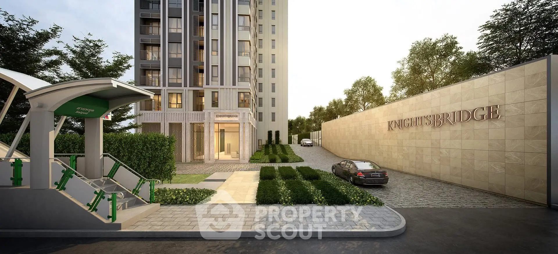 Luxurious Knightsbridge building entrance with lush landscaping and modern architecture.