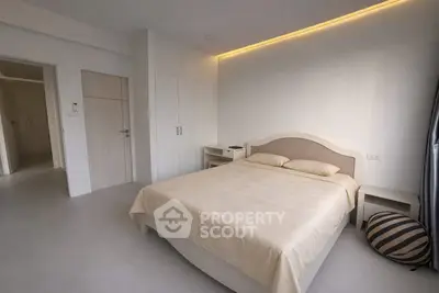 Modern bedroom with minimalist design and ambient lighting