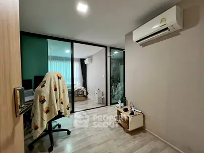 Modern study room with air conditioning and bedroom view