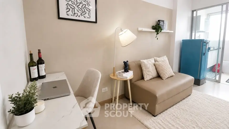 Chic living room with modern decor and cozy seating in a stylish apartment.