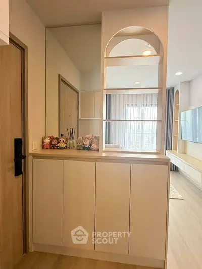 Modern apartment interior with stylish shelving and natural light
