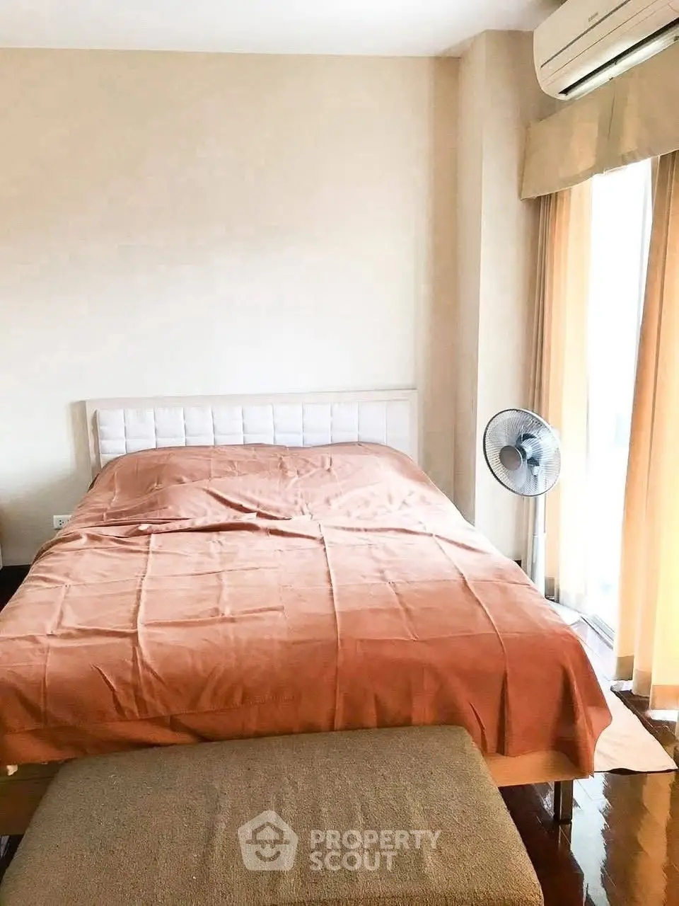 Cozy bedroom with natural light and modern decor