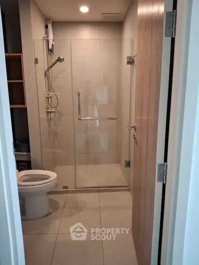 Modern bathroom with glass shower and sleek design