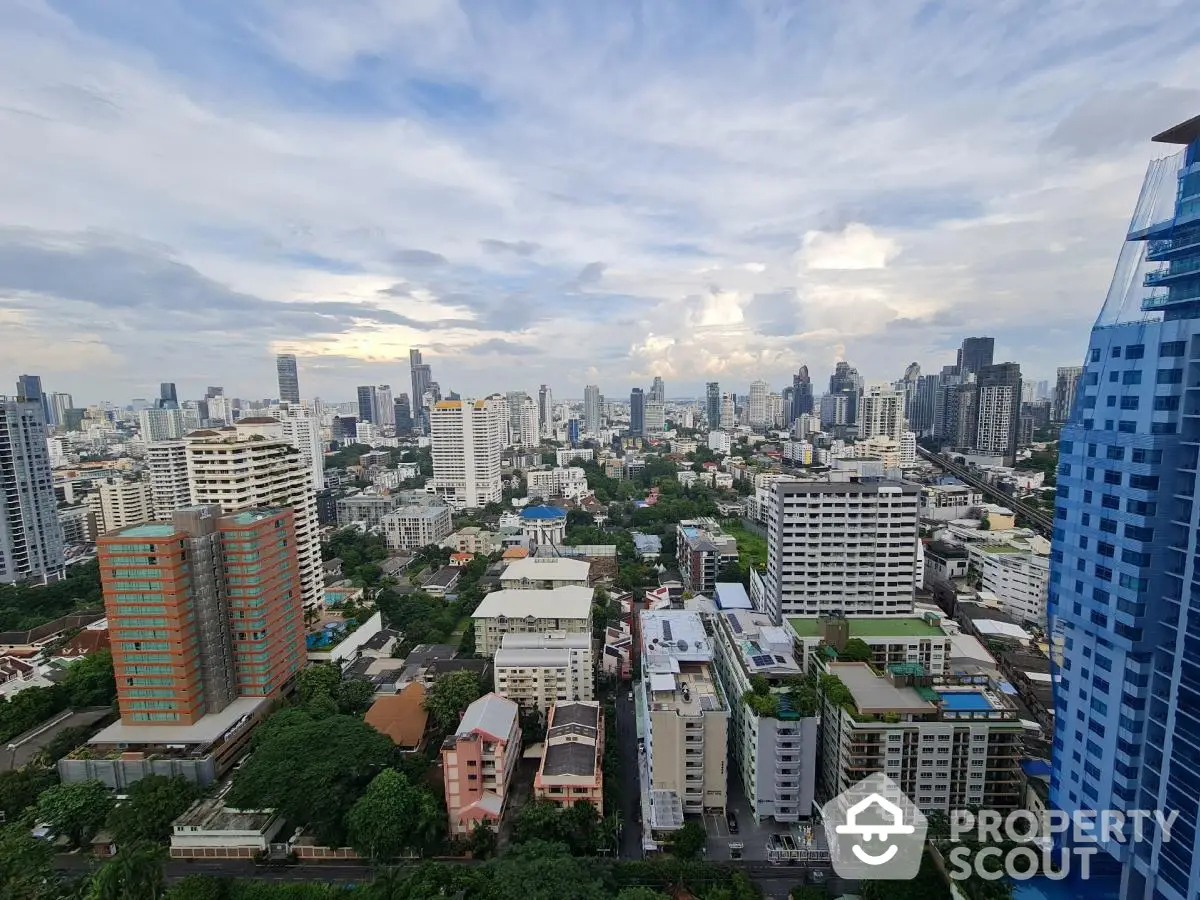 Stunning cityscape view from high-rise building showcasing urban skyline and vibrant city life.