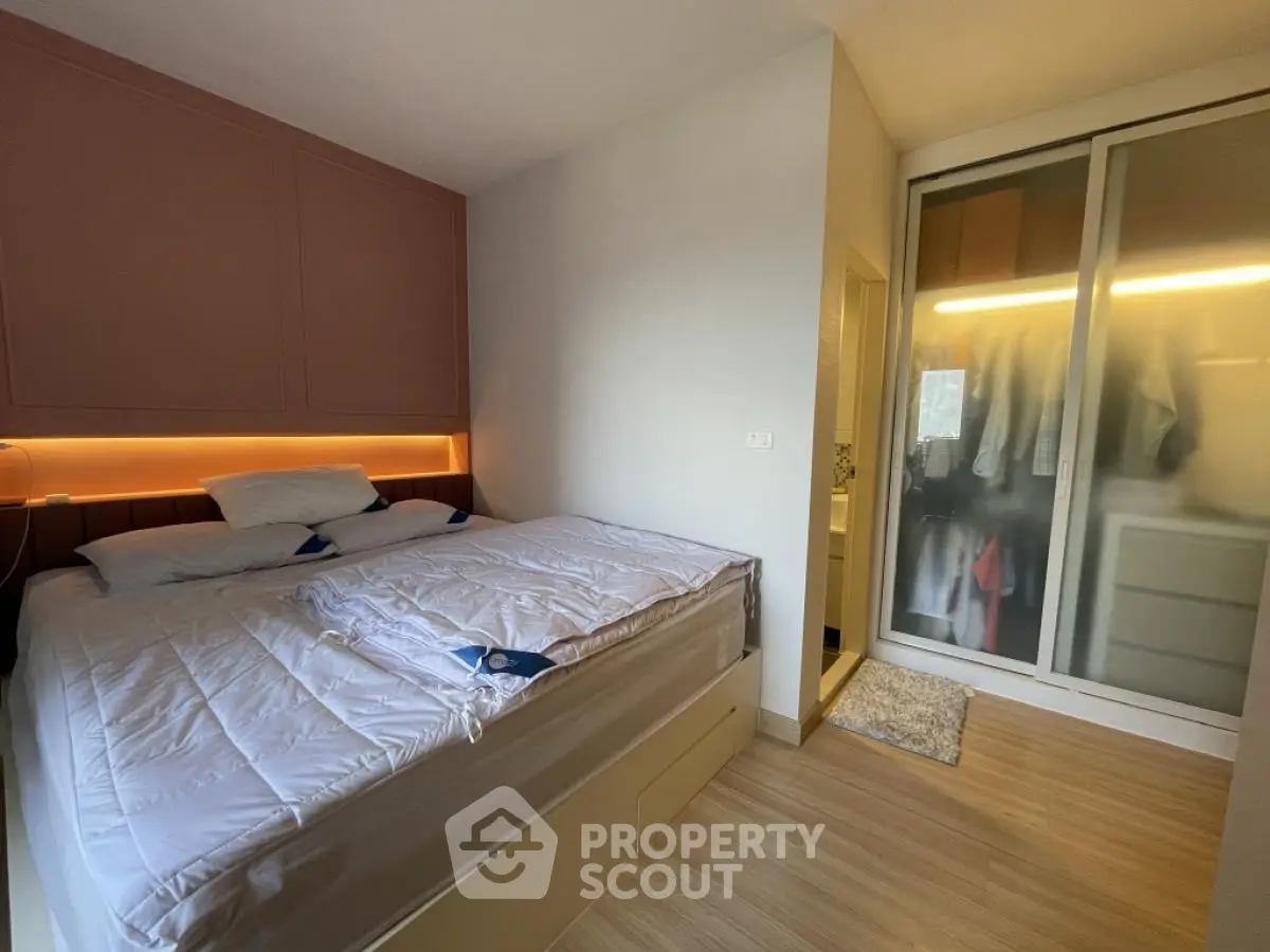 Cozy bedroom with modern design and ample closet space