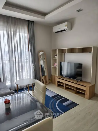 Modern living room with stylish furniture and natural light