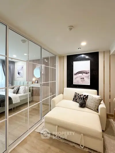 Luxurious bedroom with mirrored closet and elegant decor