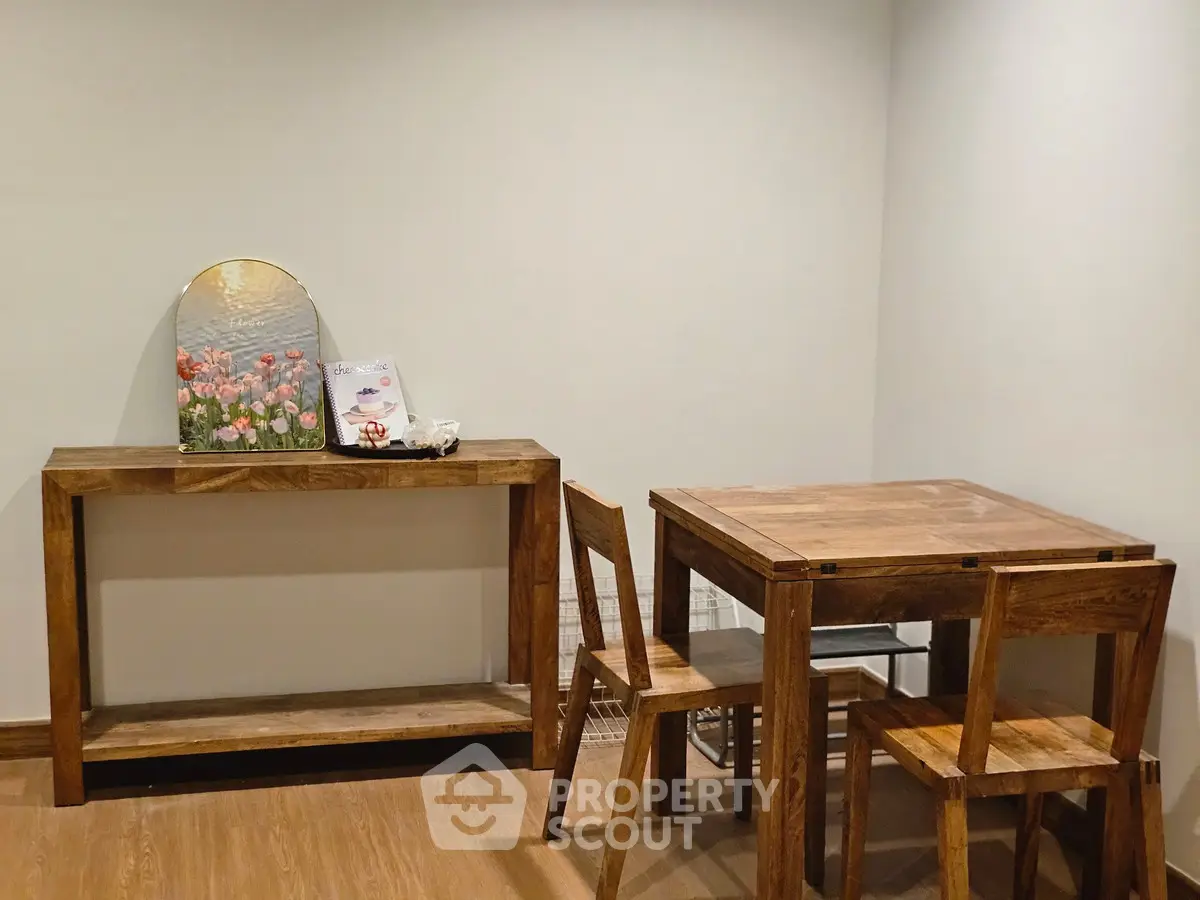 Charming wooden dining set in cozy interior with elegant decor