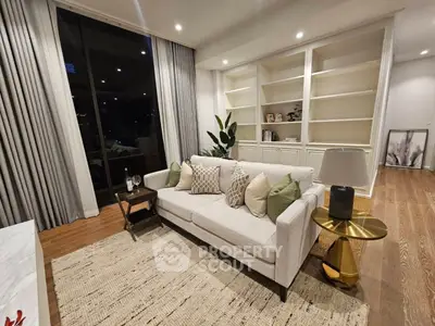 Elegant living room with modern furnishings, hardwood floors, and tasteful decor, perfect for upscale urban living.