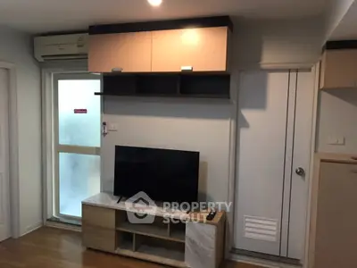 Modern living room with TV and stylish storage solutions