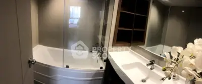 Modern bathroom with sleek bathtub and elegant sink design