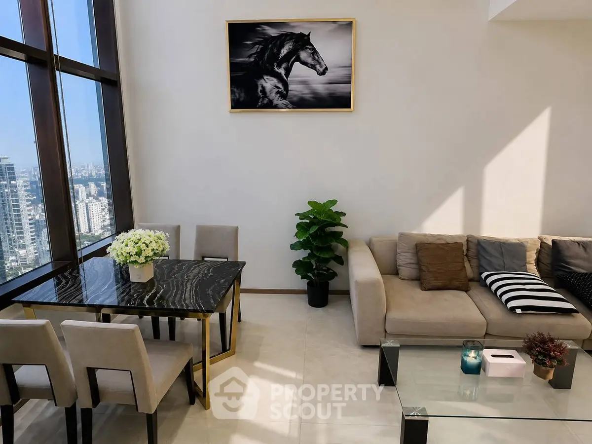 Luxurious living room with stunning city view, elegant dining area, and modern decor in high-rise apartment.