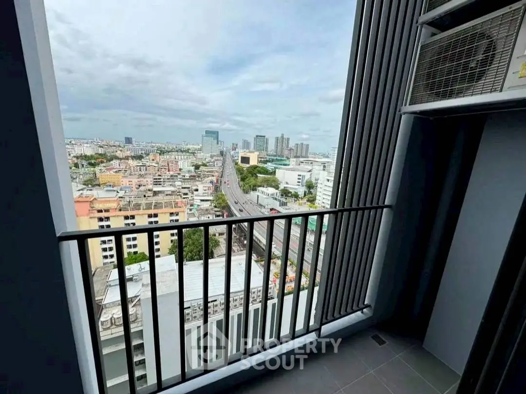 Stunning cityscape view from a modern high-rise balcony, perfect for urban living enthusiasts.