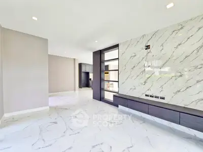 Luxurious modern living room with marble accents and open layout