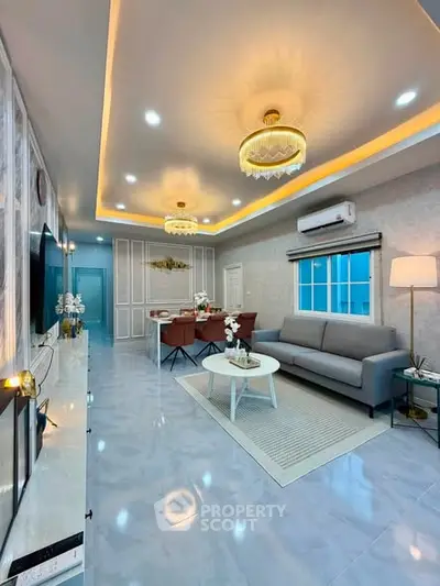 Luxurious modern living room with elegant lighting and stylish decor