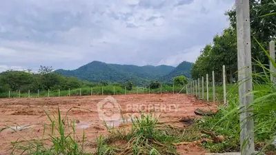 Scenic land plot with mountain views, ideal for development or investment.