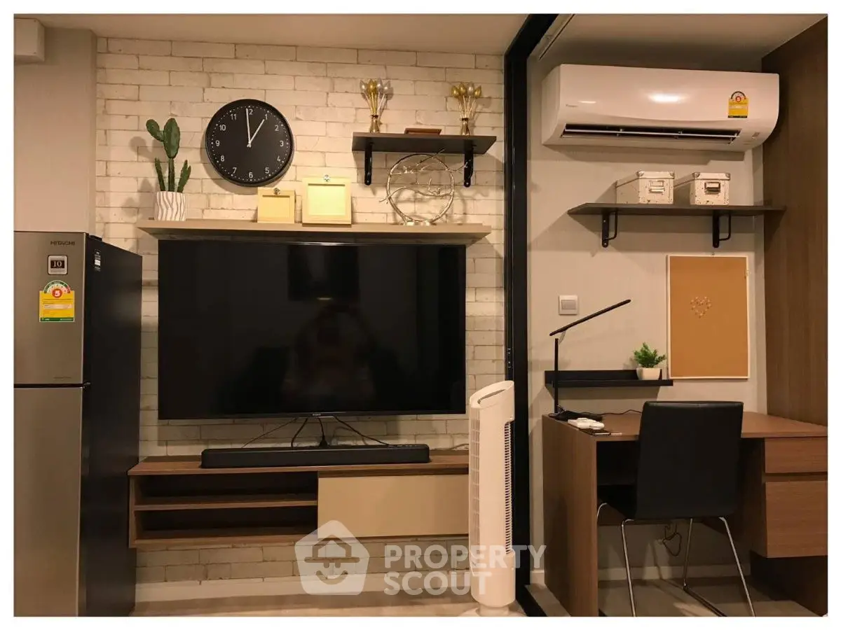 Modern living room with wall-mounted TV and stylish decor
