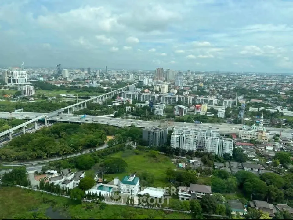 Stunning cityscape view showcasing lush greenery and urban skyline, perfect for real estate investment.