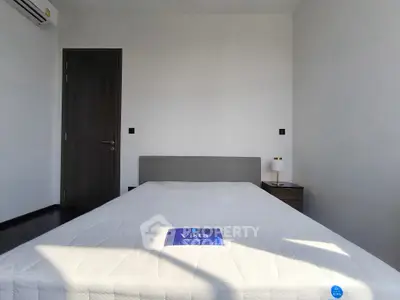 Minimalist bedroom with modern design and natural light