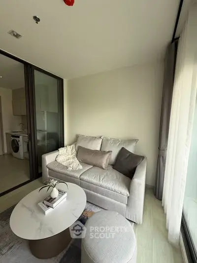 Modern living room with cozy sofa and stylish decor in a bright apartment