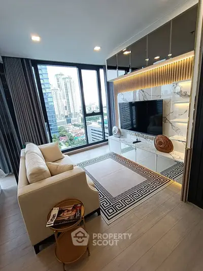 Luxurious living room with stunning city view, modern decor, and elegant furnishings in high-rise apartment.