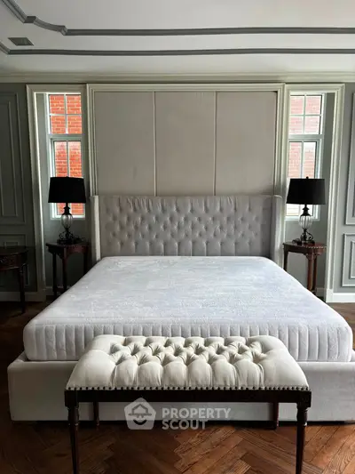 Luxurious bedroom with elegant tufted bed and stylish decor