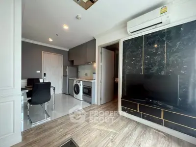 Modern apartment interior with sleek kitchen and stylish living area