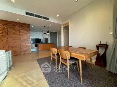 Spacious modern living room with dining area and open kitchen layout